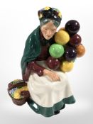 A Royal Doulton figure, 'The Old Balloon Seller', HN1315.