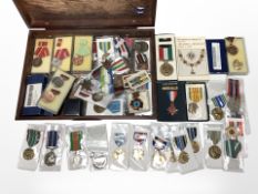 A large quantity of assorted medals including several World War II service medals,