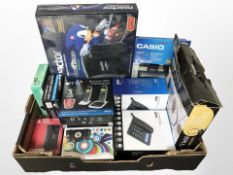 A group of home electricals including telephones, Reactor Sega Mega Drive game console, in box,