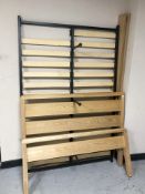 A contemporary oak four foot bed frame.