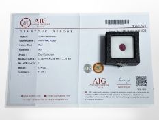 A natural red oval cabochon ruby, 4.44ct, with certification.