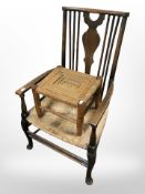 A child's farmhouse armchair and similar rattan stool