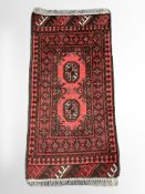 A Turkoman rug, Afghanistan, 95 cm x 49 cm.