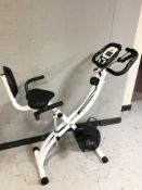 A Total folding exercise bike.