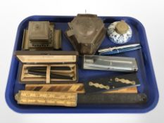 Three inkwells, folding rule,