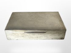 A silver cigarette box with engine turned decoration, Walker & Hall Ltd,