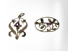 A 9ct yellow gold brooch set with gemstones together with an antique 9ct gold pendant.