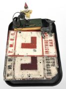 Two cast and painted metal TMES instruction car plaques together with a novelty cast iron money box