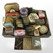 An assortment of vintage and later tins and boxes,