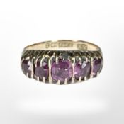 A 9ct yellow gold dress ring set with amethyst, size L CONDITION REPORT: 2g.