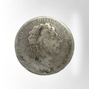 A George III silver crown.
