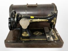 A Singer hand sewing machine