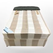 A 4' divan with Dreamode mattress and headboard