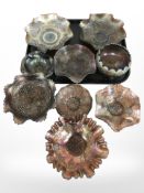 A group of carnival glass bowls