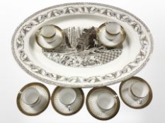 A set of six Royal Doulton porcelain coffee cans and saucers and a transfer printed plate,