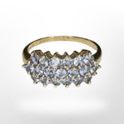 A 9ct gold tanzanite dress ring, size U1/2 CONDITION REPORT: 4.