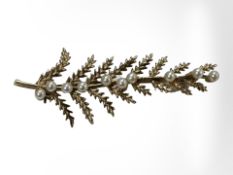 A 9ct yellow gold brooch modelled as a branch, length 50 mm. CONDITION REPORT: 4.