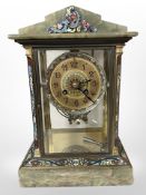 A French brass onyx and champleve enamel eight day mantel clock, with mercury pendulum,