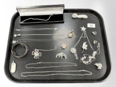 A group of silver jewellery, filigree items, chains, necklaces, engraved bangle,