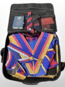 A case of assorted Masonic regalia and decorations.