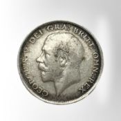 A George V 1918 silver half crown.