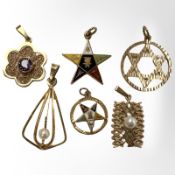 A group of six 9ct yellow gold pendants, two set with pearls and one amethyst.