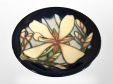 A modern Moorcroft 'Panache' pin dish, dated 2004, diameter 12 cm, with original box.