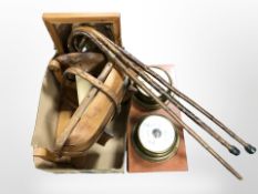 A contemporary quartz time piece and barometer on board together with several walking sticks,