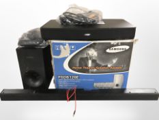 A Bose solo TV soundsystem, a Samsung soundbar, a Samsung speaker,