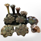 A group of carnival glass bowls and three vases