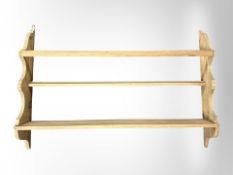 A 19th century pine plate rack,