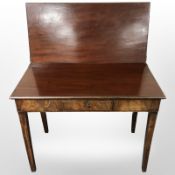 A Victorian mahogany tea table, fitted a drawer, 92 cm x 46 cm x 73 cm.