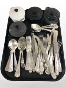 Four small Le Creuset enamelled earthenware pans with lids and a quantity of EPNS flatware