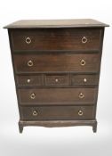 A Stag seven drawer chest, 81 cm x 47 cm x 112 cm,