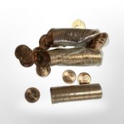 A quantity of uncirculated copper half penny coins.