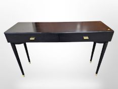 A contemporary two drawer console table in an ebonised finish, 120 cm x 36 cm x 80 cm.