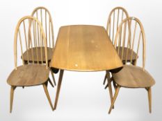 An Ercol elm and beech drop leaf dining table,