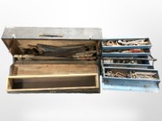 An antique joiner's tool box and an metal concertina box containing assorted hand saws,