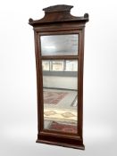 A 19th century continental mahogany mirror, 70 cm x 173 cm.