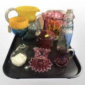 A two-tone glass jug and similar goblet, Italian studio glass vase, three pieces of cranberry glass,