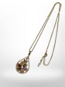 A synthetic gemstone gold plated necklace with pendant