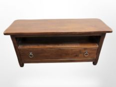 A contemporary stained pine entertainment stand,