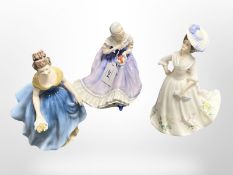 Three Royal Doulton figures, 'Adele' HN2480, 'Melanie' HN2271 and 'Happy Anniversary' HN3097.