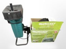 A Qualcast lawn raker, in box, and a Bosch garden shredder.