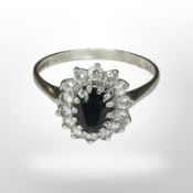 A 9ct white gold cluster dress ring, size S CONDITION REPORT: 2.