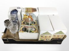 A group of boxed Ringtons ceramics, a crystal decanter and a pair of wine glasses.