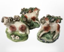 Three pearl ware figures of sheep, circa 1800, tallest 9.