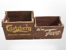 Two painted pine bottle crates marked 