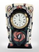 A modern Moorcroft quartz mantel timepiece, height 16 cm.
