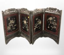 An early 20th century Japanese Shibayama lacquer four-fold screen,